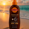  عبوة زيت تسمير كاروتين SPF6 – 200 مل على خلفية شاطئية